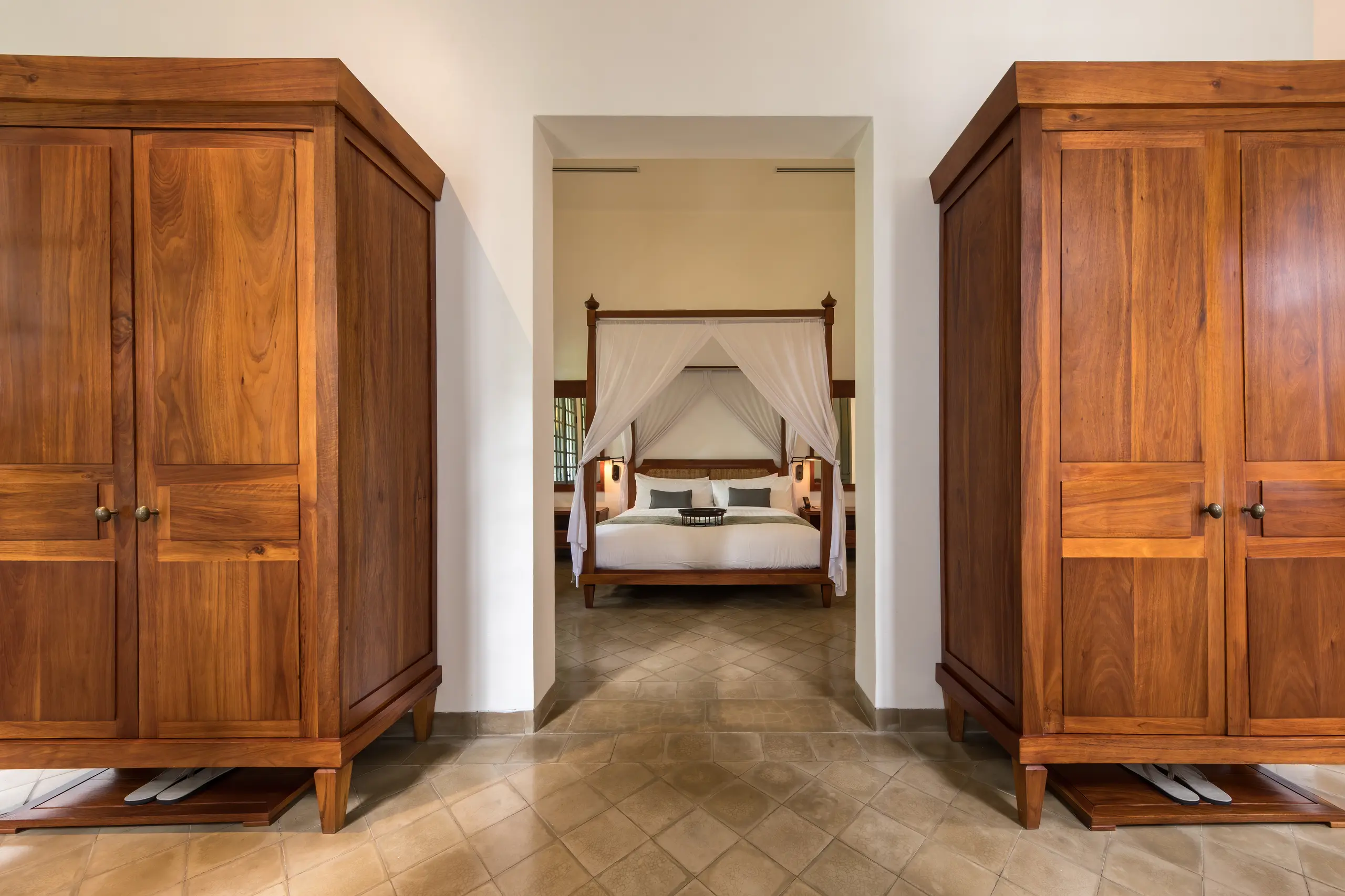 Bedroom with warm timber fitted wardrobes